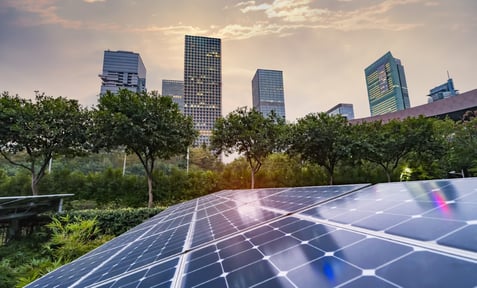 Ecological energy renewable solar panel plant with urban landscape landmarks (1) (Medium)