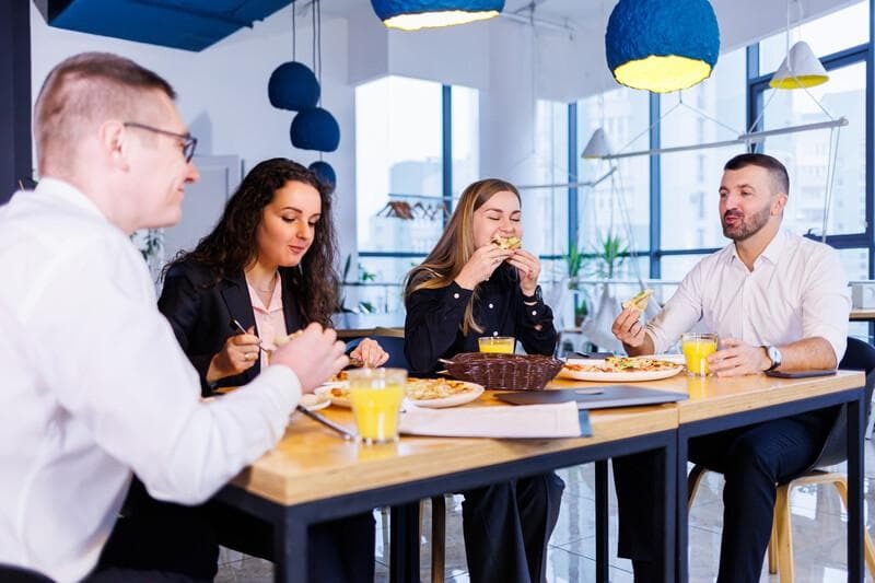 webimage-Colleagues-having-lunch-at-a-cafeteria